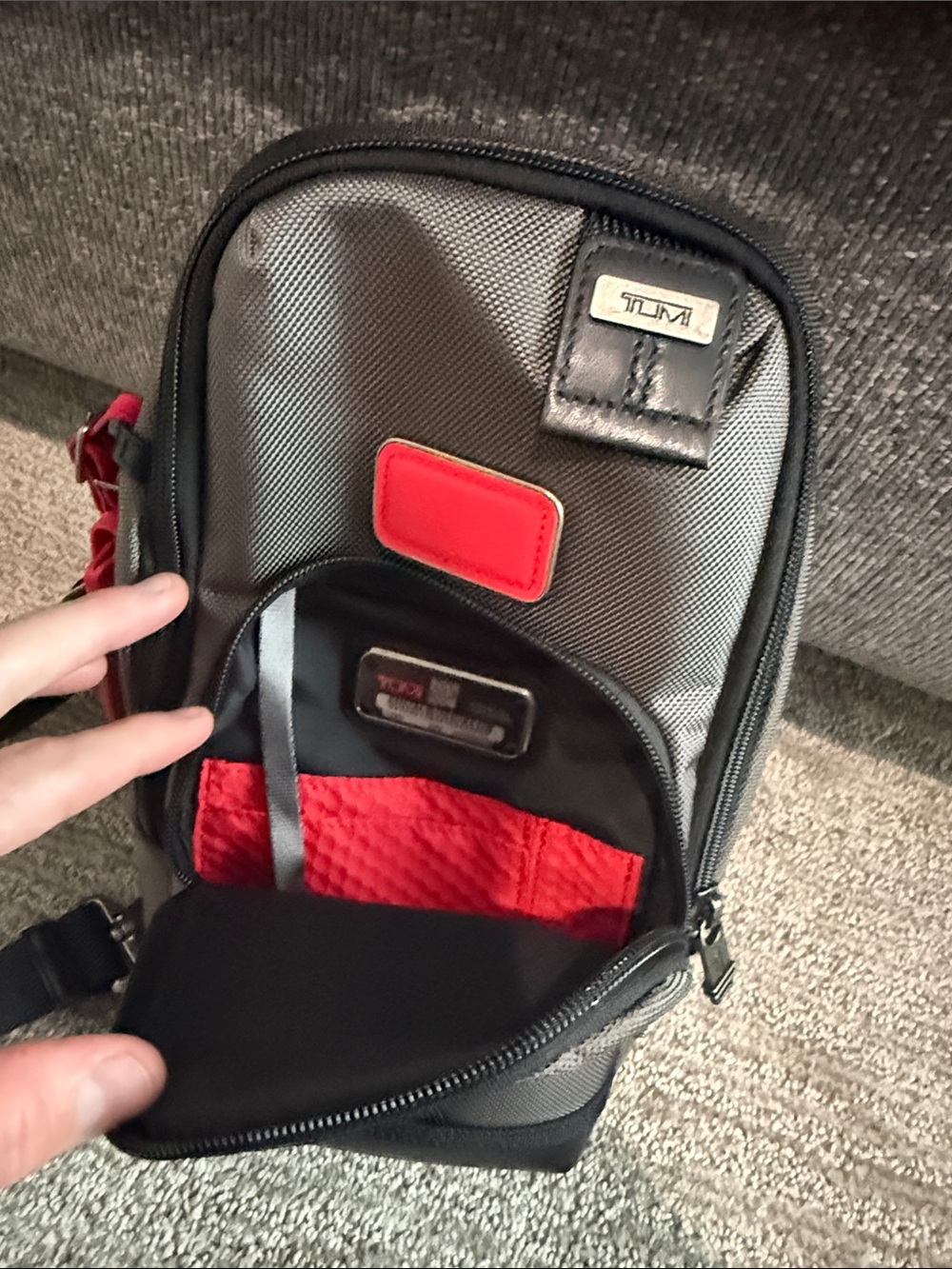 Tumi Gray Sling Bag with Red Accent- NEVER USED OR WORN. Tags removed, A gift - Picture 3 of 9